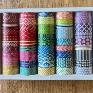WASHI TAPE 45 Rolls in various sizes and designs.